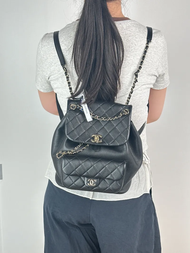 Chanel Backpack Duma Black Grained Calfskin Large21 × 13 × 23 cm — on-model view 1 of 3