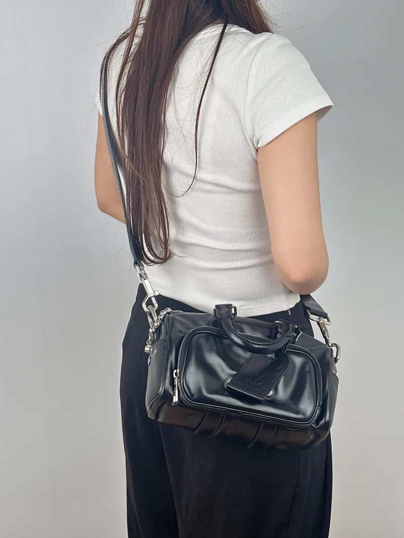 Louis Vuitton Crossbody Bag Keepall Cargo 25 Medium 25 × 11 × 15 cm — on-model view 2 of 2