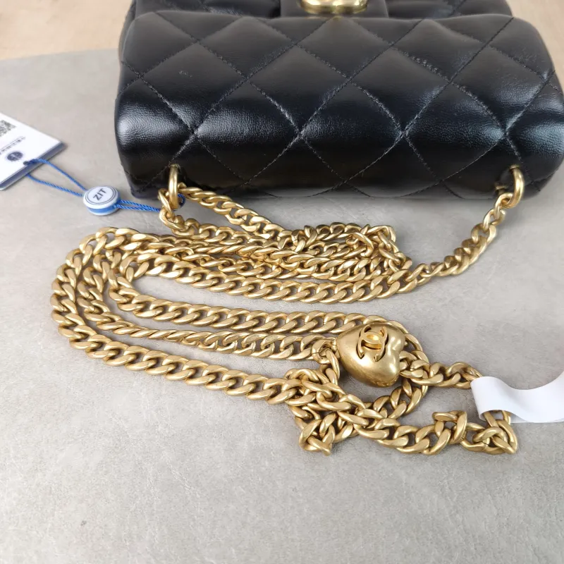 Chanel Crossbody Bag Black with Gold-Tone Hardware Lambskin Mini 18 × 5 × 12 cm — detail view 6 of 10