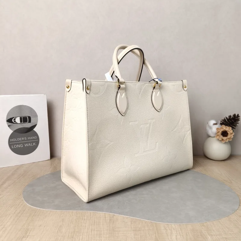Louis Vuitton Shoulder Bag Onthego Medium White Monogram Empreinte Embossed Calfskin Medium 35 × 14 × 27 cm — cover view 2 of 5