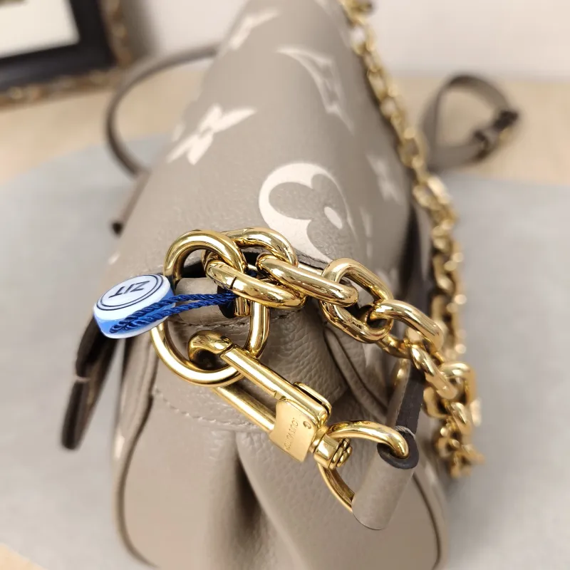 Louis Vuitton Crossbody Bag Favorite Empreinte Embossed Calfskin Monogram Medium24 × 9 × 14 cm — detail view 8 of 18
