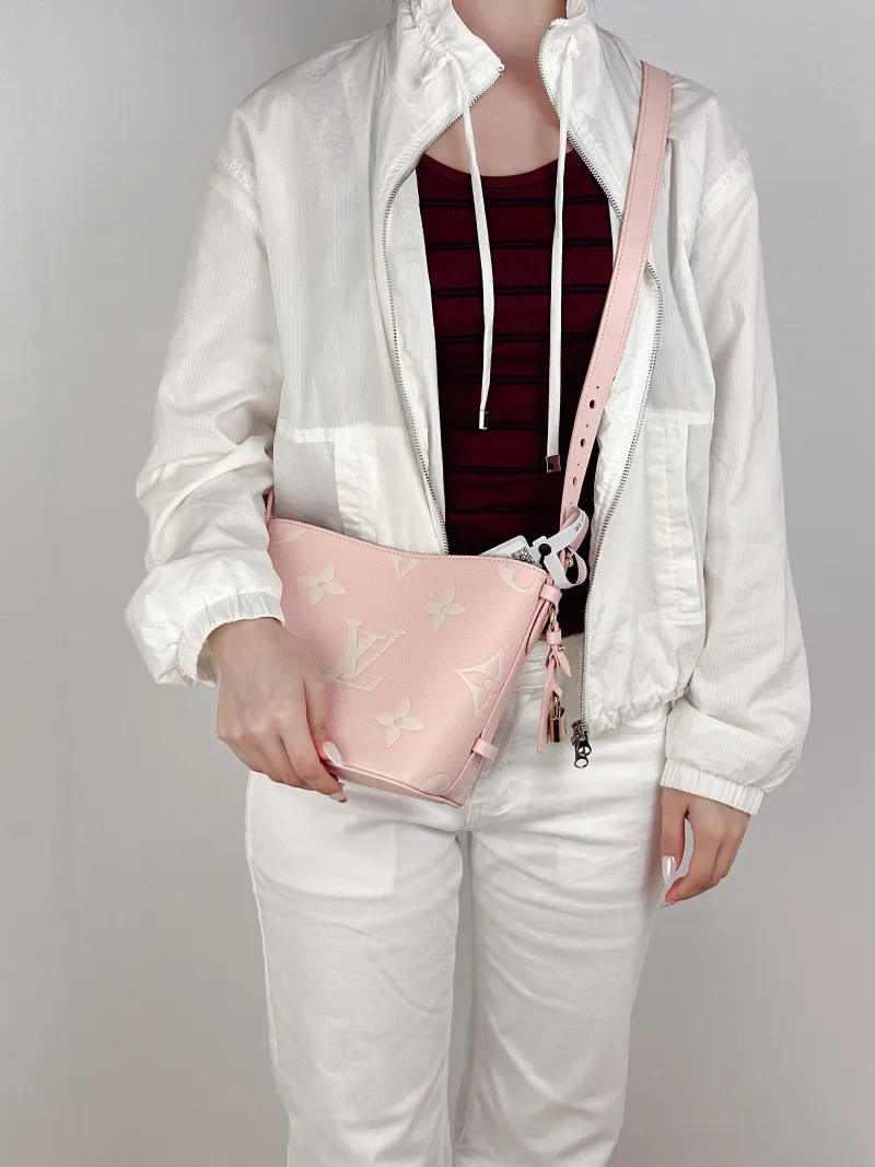 Louis Vuitton Top Handle Bag ALL IN BB · White Empreinte Embossed Calfskin Monogram BB18 × 12 × 16 cm — on-model view 2 of 2