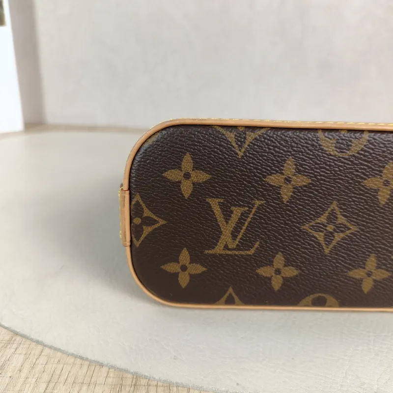 Louis Vuitton Crossbody Bag Alma Nano Monogram PVC nano 18 × 8 × 12 cm — detail view 6 of 12