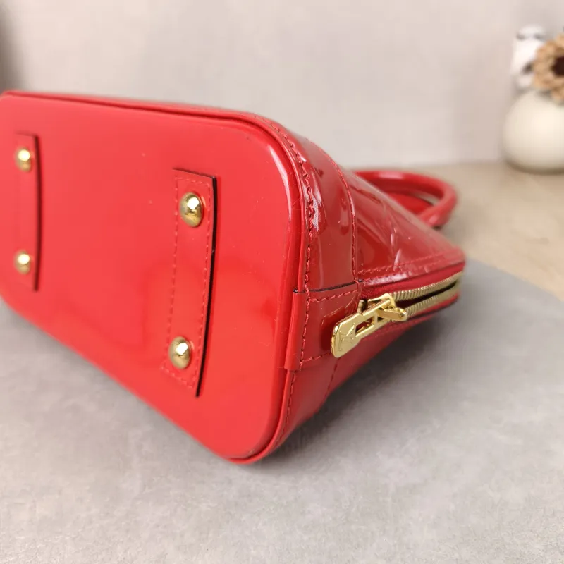 Louis Vuitton Crossbody Bag Alma BB Patent Leather BB 23.5 × 11.5 × 17.5 cm — detail view 5 of 11