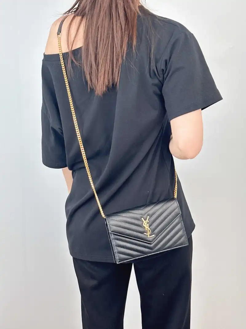 SAINT LAURENT Crossbody Bag CASSANDRE ENVELOPE Black Calfskin One Size 19 × 3.5 × 12.5 cm — on-model view 2 of 3