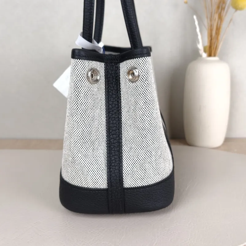 Hermès Top Handle Bag Neo Garden 23 Mini Black · Beige Canvas · Negonda Calfskinmini23 × 10 × 16 cm — detail view 7 of 9