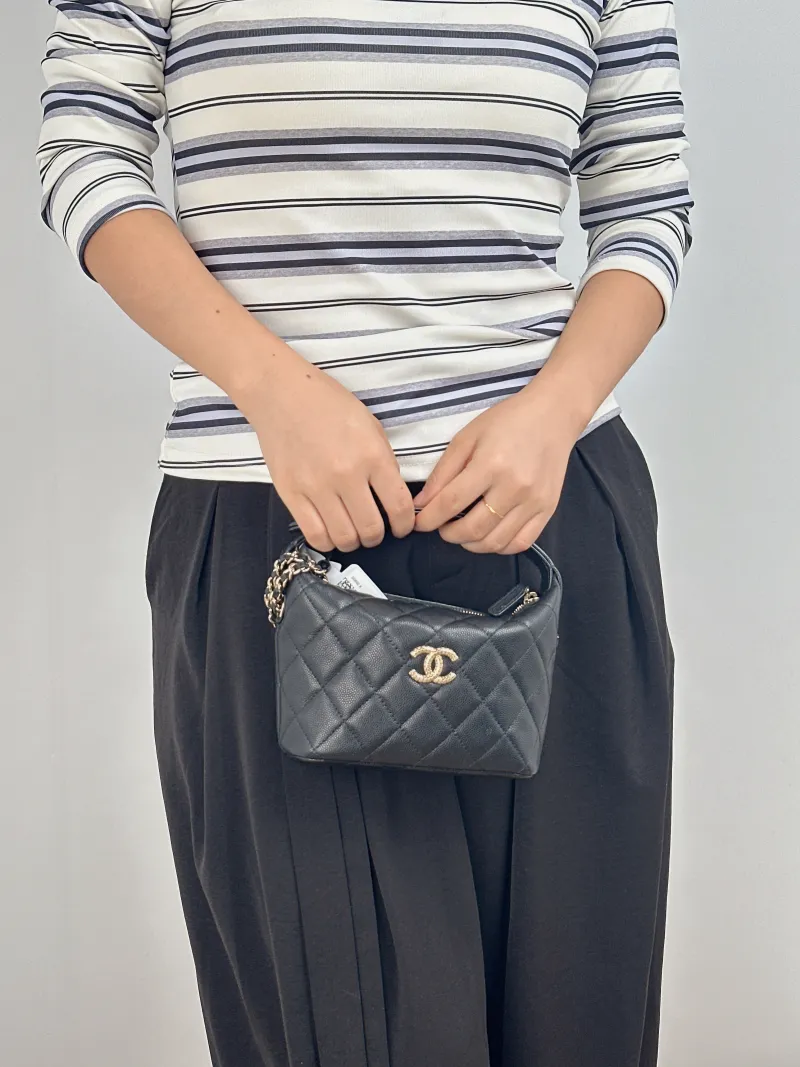 Chanel Crossbody Bag Gold-Tone Hardware Black Grained Calfskin 15.5 × 6 × 12.5 cm — on-model view 2 of 2
