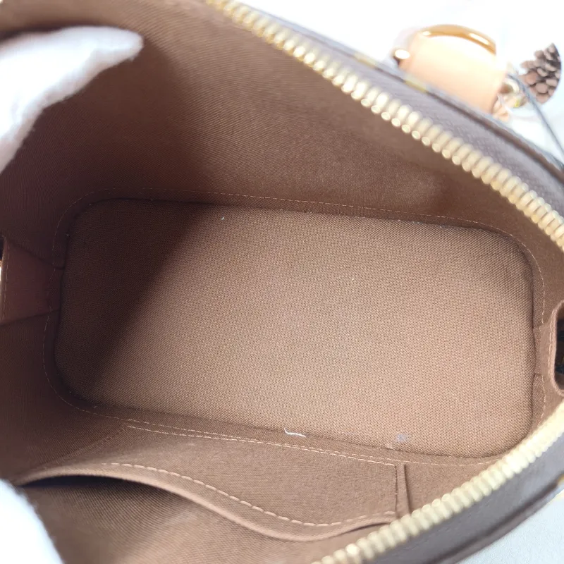 Louis Vuitton Crossbody Bag Alma BB Monogram PVC BB 23.5 × 11.5 × 17.5 cm — detail view 6 of 12