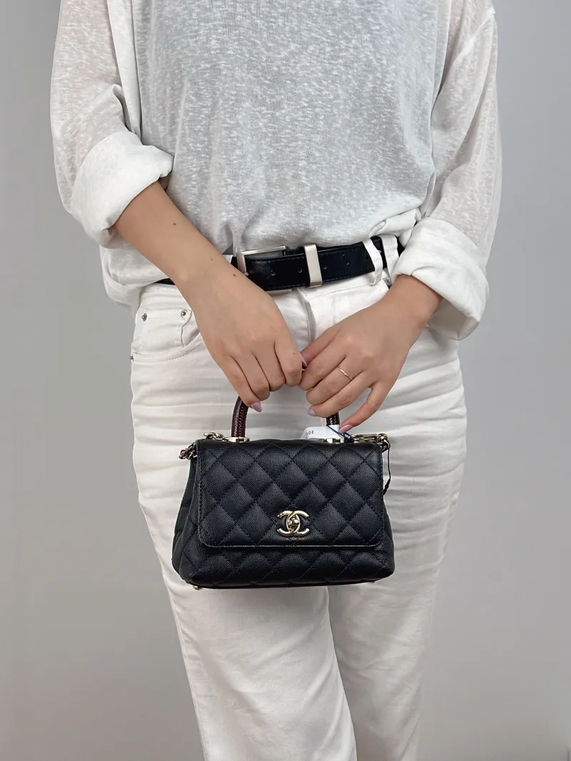 Chanel Top Handle Bag Coco Handle​ Black Grained Calfskin Mini 19 × 9 × 13 cm — on-model view 2 of 2