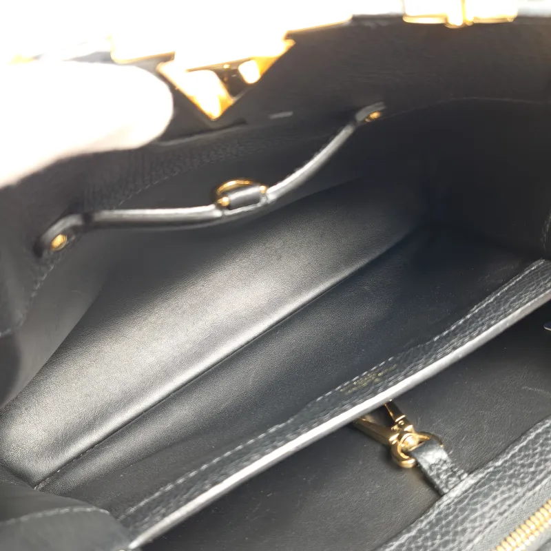 Louis Vuitton Top Handle Bag Capucines Black · Calfskin Medium31.5 × 11 × 20 cm — detail view 12 of 14