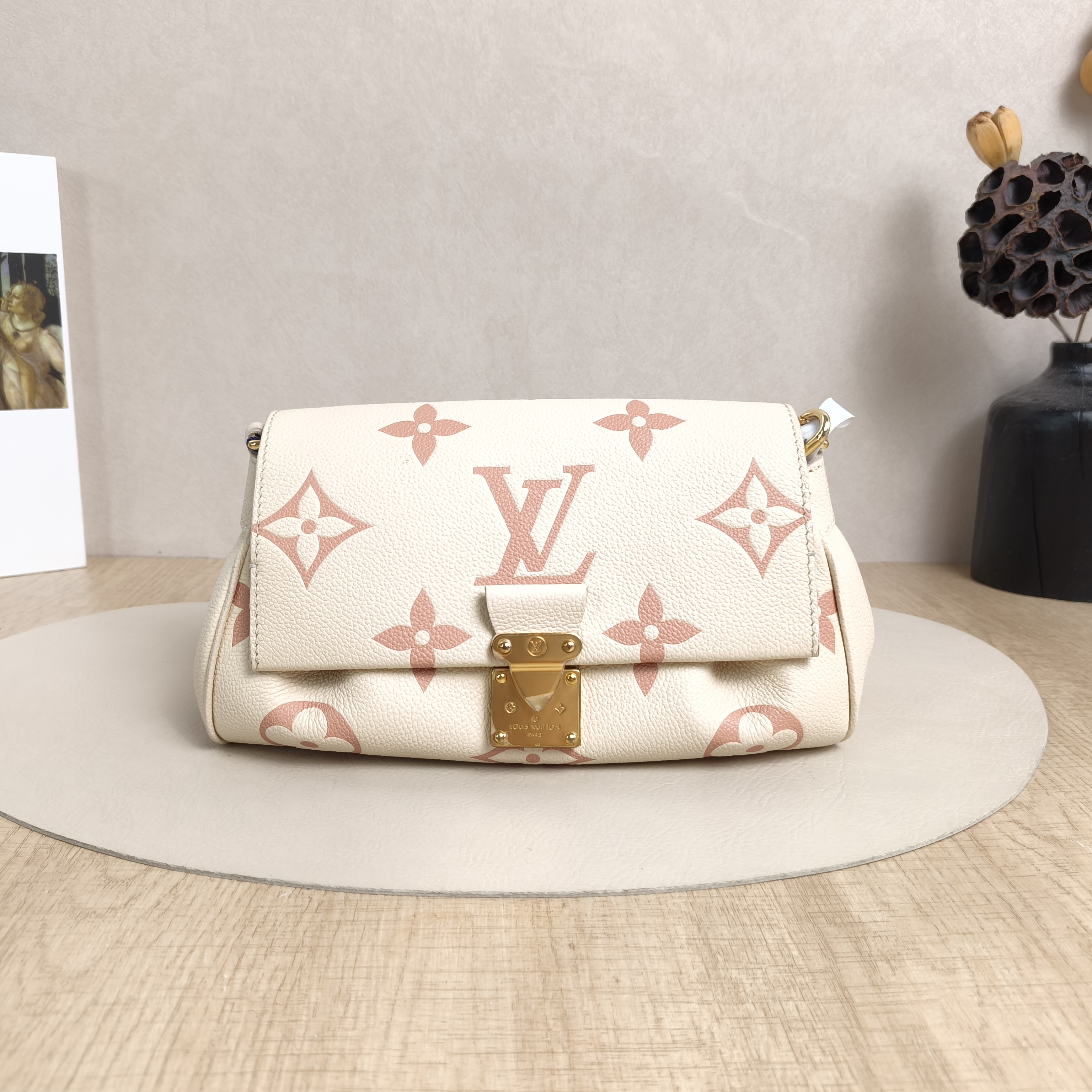 Louis Vuitton Crossbody Bag Favorite White · Pink Monogram Empreinte Embossed Calfskin Medium24 × 9 × 14 cm
