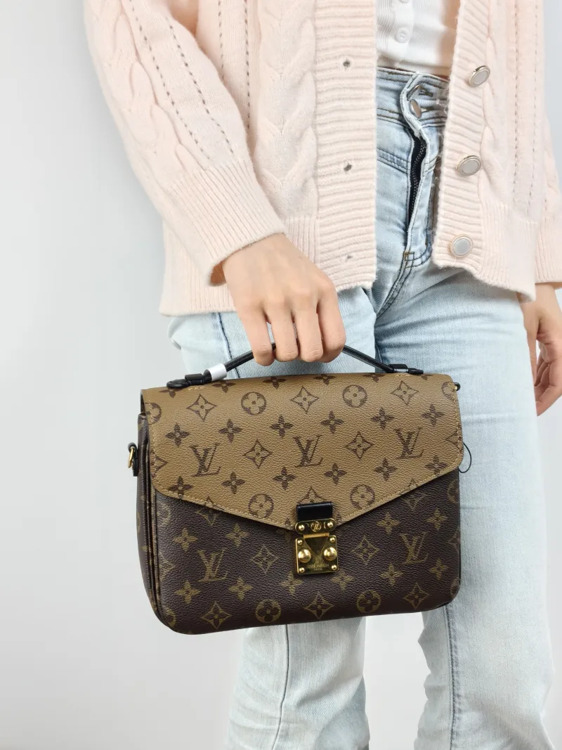 Louis Vuitton Crossbody Bag Pochette Métis Monogram Colorblock PVC Medium 25 × 7 × 19 cm — on-model view 2 of 2