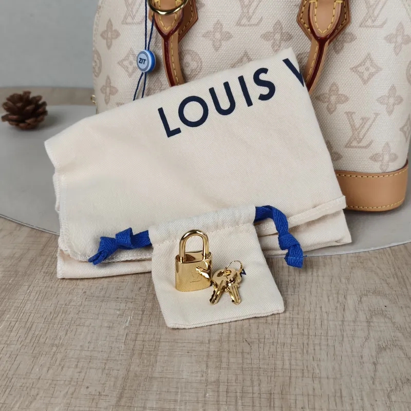 Louis Vuitton Top Handle Bag Alma BB PVCBB23.5 × 11.5 × 17.5 cm — detail view 12 of 12