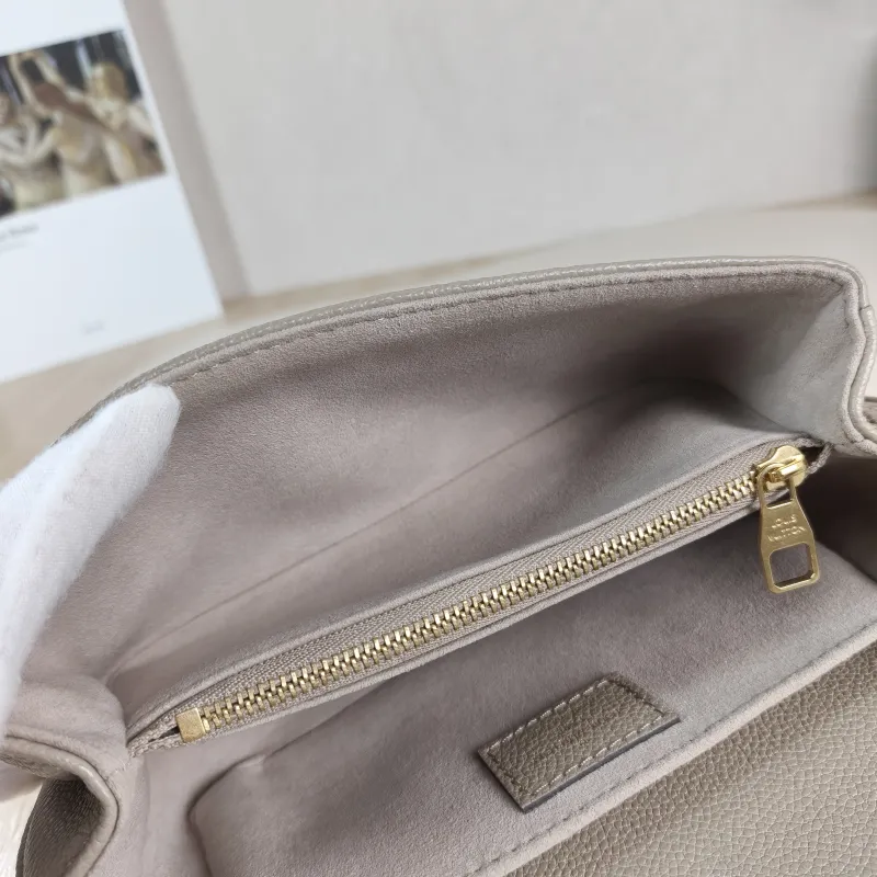 Louis Vuitton Crossbody Bag Pochette Métis East West Monogram Empreinte Embossed Calfskin Small 21.5 × 6 × 13.5 cm — detail view 1 of 12