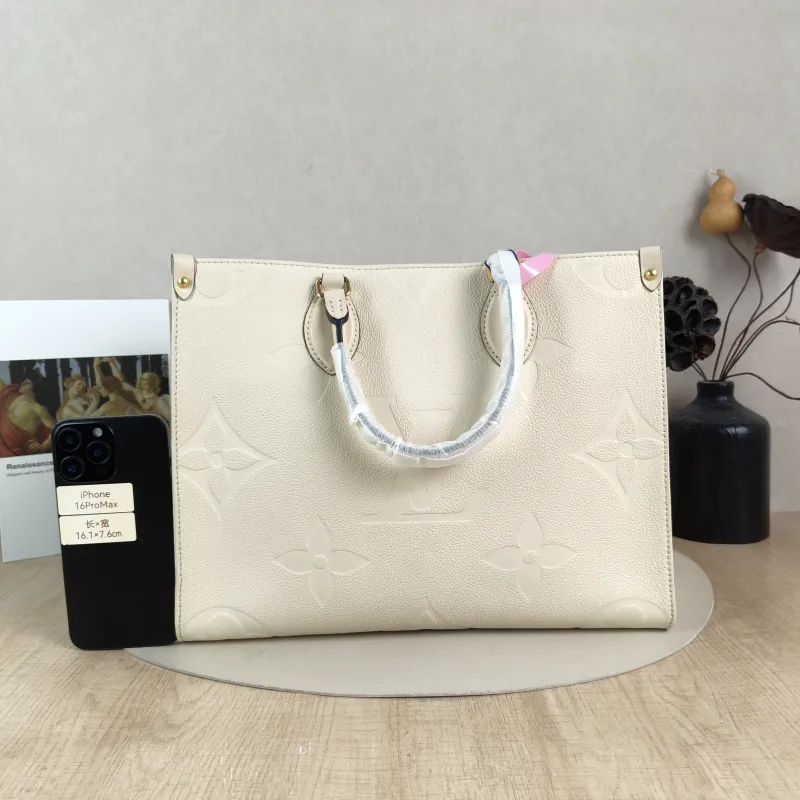 Louis Vuitton Shoulder Bag Onthego Medium White Empreinte Embossed Calfskin Medium 35 × 14 × 27 cm — cover view 5 of 5
