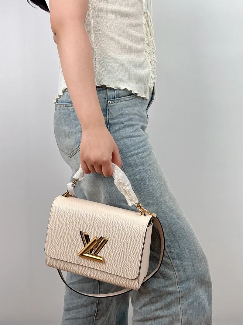 Louis Vuitton Crossbody Bag Twist White Epi Embossed Calfskin Medium 23 × 9.5 × 17 cm — on-model view 2 of 2
