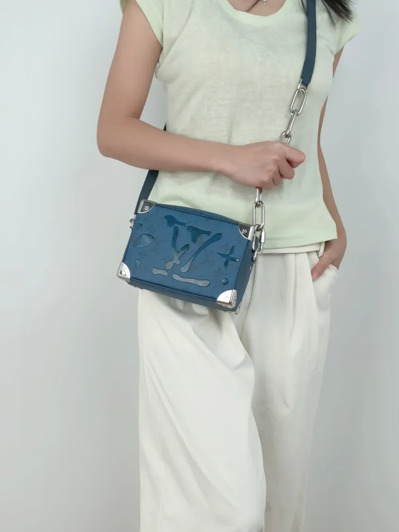 Louis Vuitton Crossbody Bag SOFT TRUNK Box Blue PV Cmini18.5 × 8 × 13 cm — on-model view 1 of 3