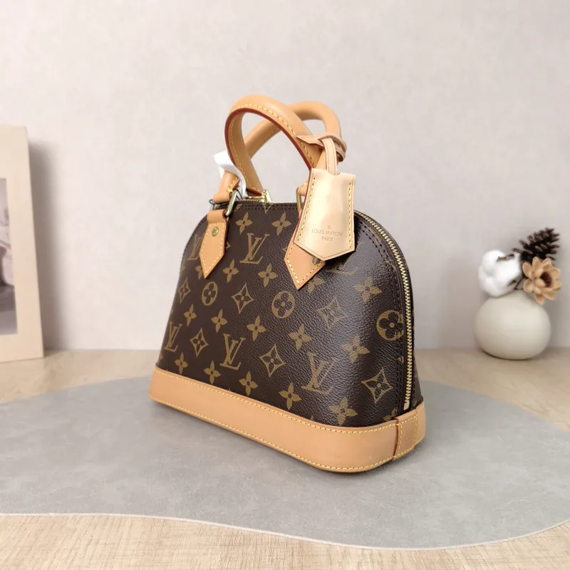 Louis Vuitton Crossbody Bag Alma BB Monogram PVC BB 23.5 × 11.5 × 17.5 cm — cover view 4 of 6