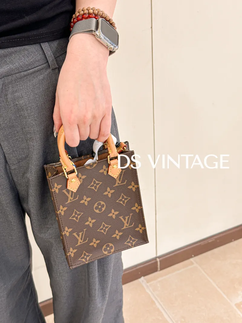Louis Vuitton Crossbody Bag PETIT SAC PLAT Mini Monogram PV Cmini14 × 5 × 17 cm — on-model view 1 of 3