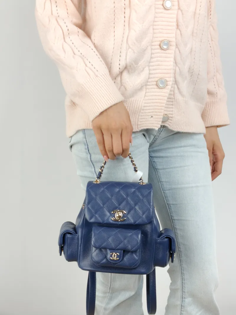 Chanel Backpack duma Navy Grained Calfskin Small 18 × 9.5 × 19 cm — on-model view 2 of 3