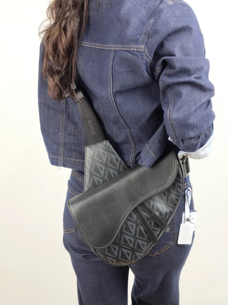 DIOR Crossbody Bag saddle Black PVC · Calfskin One Size 26 × 4.5 × 19 cm — on-model view 1 of 2