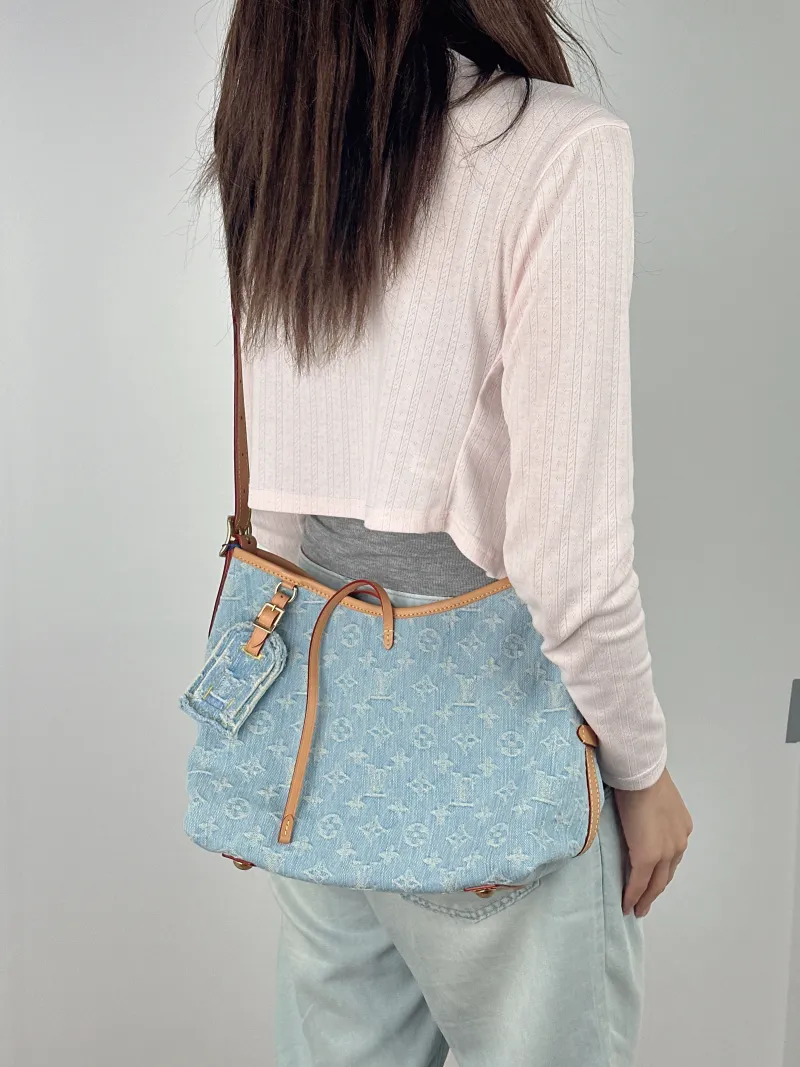 Louis Vuitton Crossbody Bag Carryall Blue Small 29 × 12 × 24 cm — on-model view 1 of 2