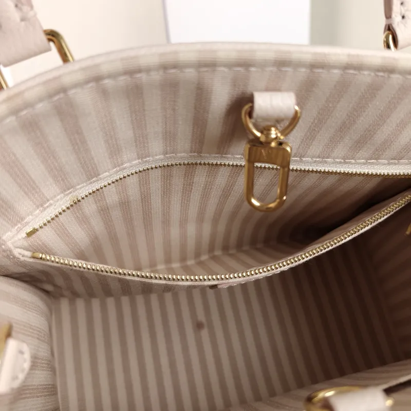 Louis Vuitton Shoulder Bag Onthego Beige · Pink Empreinte Embossed Calfskin Small 25 × 11.5 × 19 cm — detail view 10 of 12