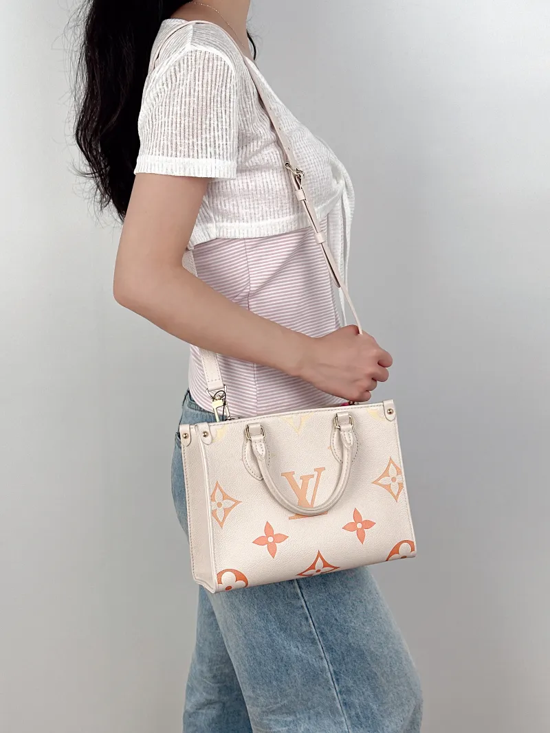 Louis Vuitton Shoulder Bag Onthego White Empreinte Embossed Calfskin Monogram Small25 × 11.5 × 19 cm — on-model view 3 of 3