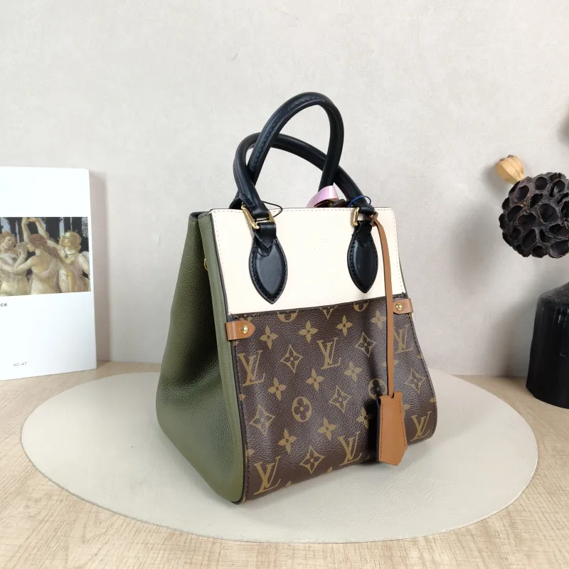 Louis Vuitton Top Handle Bag Fold Tote Colorblock PVC · Calfskin Small 20 × 18 × 22 cm — cover view 2 of 5