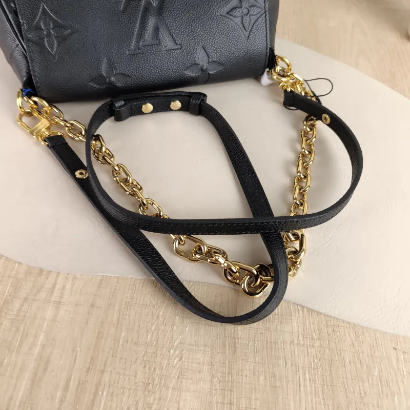 Louis Vuitton Crossbody Bag Favorite Black Monogram Empreinte Embossed Calfskin Medium 24 × 9 × 14 cm — detail view 1 of 10