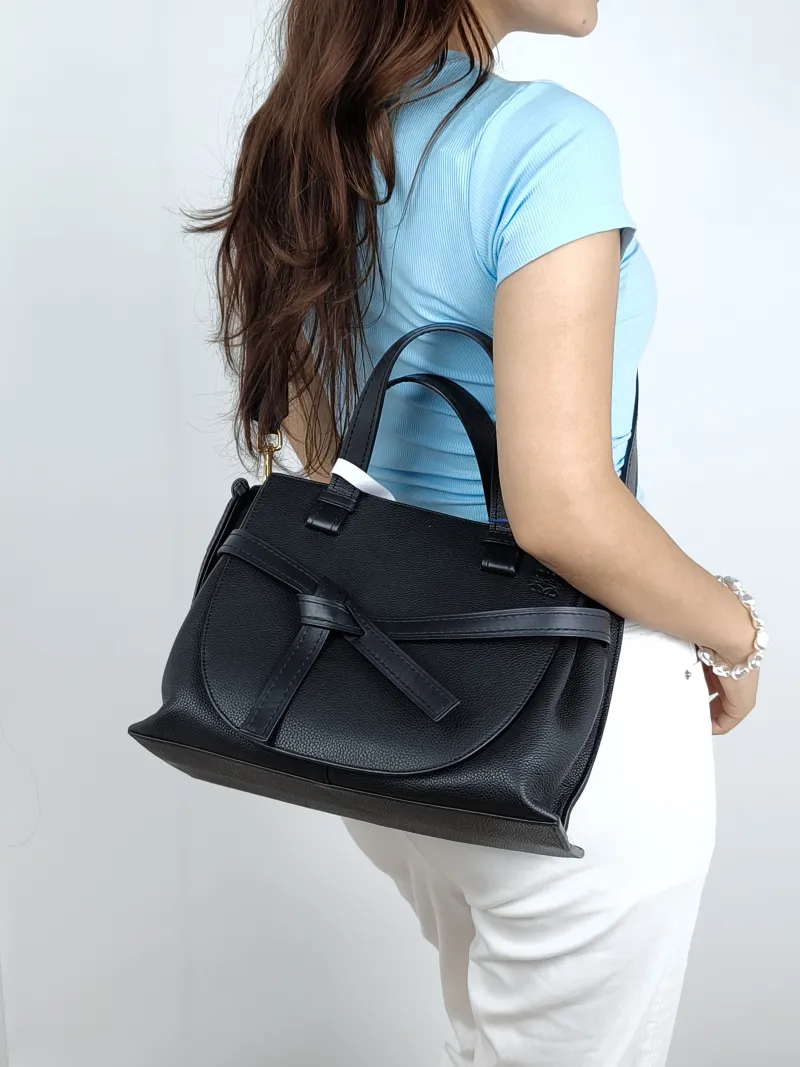LOEWE Crossbody Baggate handbag Top Handle Bag Black Calfskin Small30 × 12 × 23.5 cm — on-model view 2 of 3