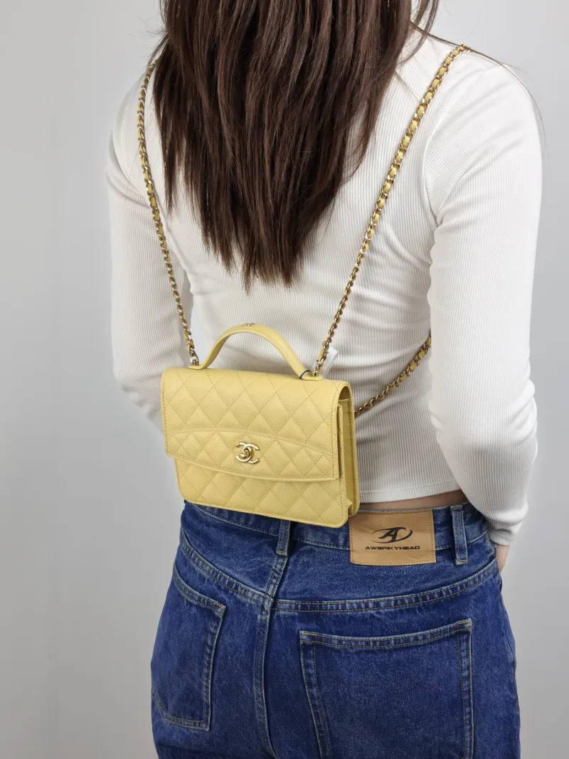 Chanel Backpack Backpack Yellow Grained Calfskin One Size 18 × 4 × 13 cm — on-model view 1 of 2
