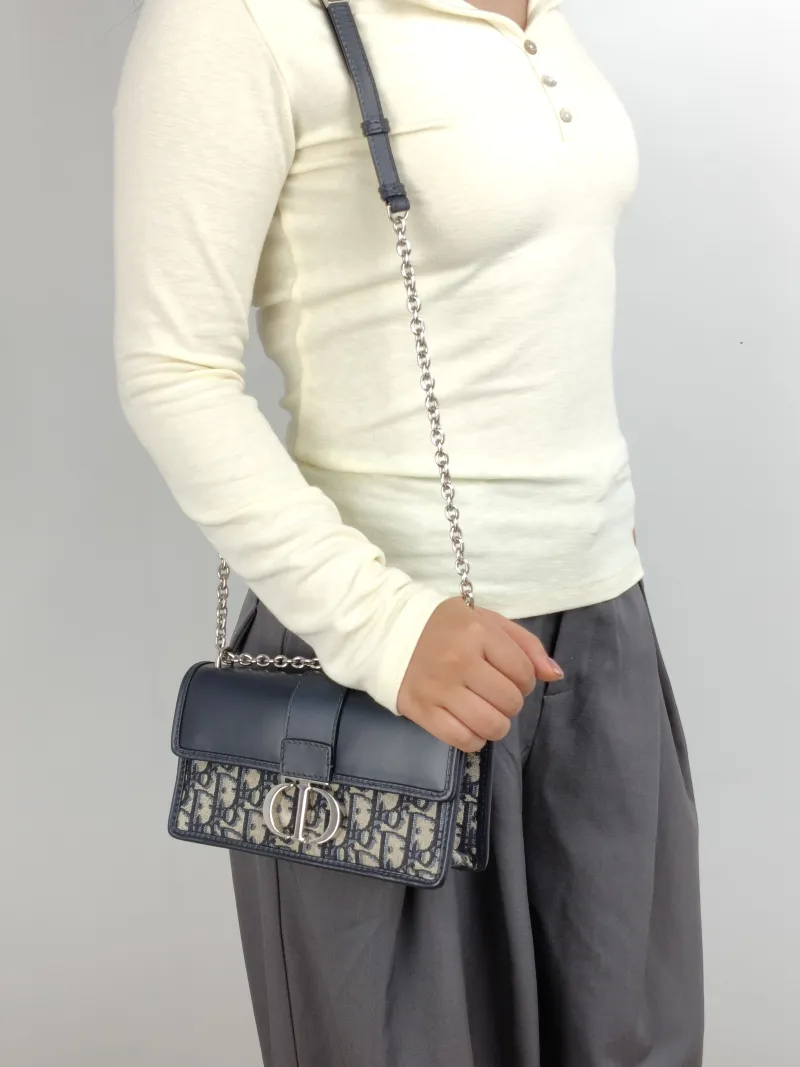 DIOR Crossbody Bag 30 Montaigne East-West 30 Blue Canvas， Small 21 × 6 × 12 cm — on-model view 3 of 3