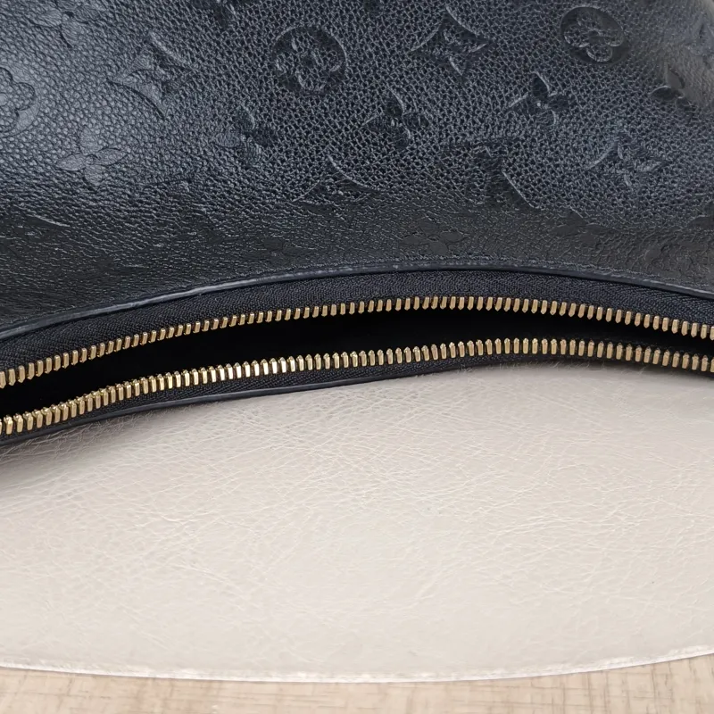 Louis Vuitton Crossbody Bag Boulogne Black Monogram Empreinte Embossed Calfskin Small 26 × 9.5 × 16 cm — detail view 3 of 10