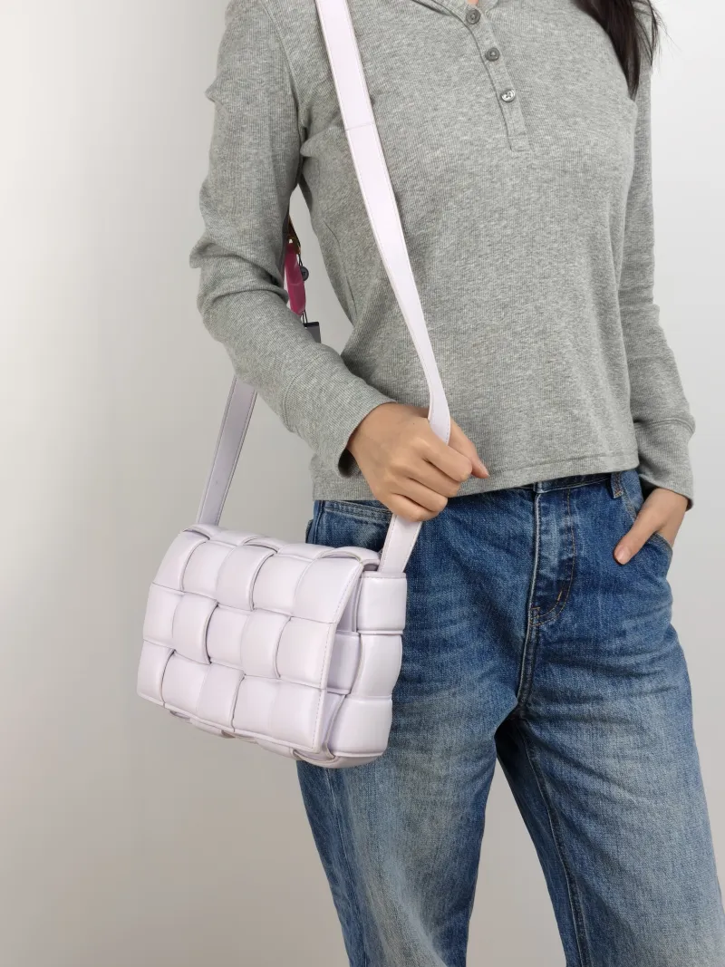 Bottega Veneta Crossbody Bag Padded Cassette Woven Lambskin Medium 26 × 8 × 18 cm — on-model view 2 of 2