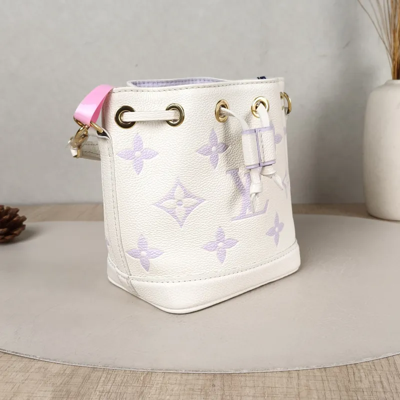 Louis Vuitton Crossbody Bag NANO NOÉ Bucket Bag Nano White · Monogram Empreinte Embossed Calfskin nano 13 × 10 × 16 cm — cover view 4 of 5