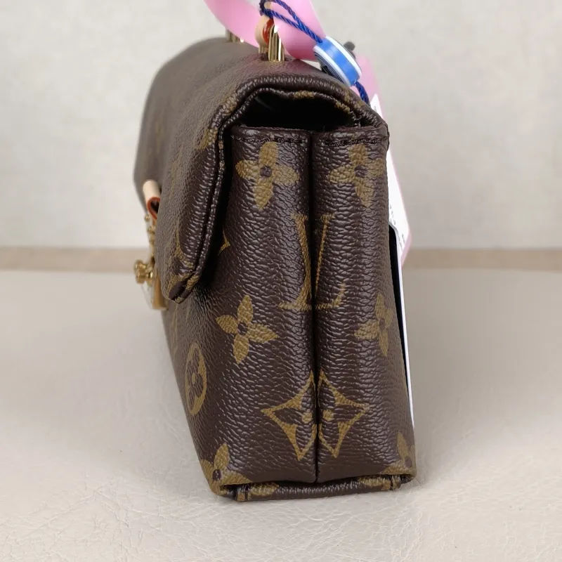 Louis Vuitton Crossbody Bag MADELEINE Monogram PVC nano 21 × 6 × 12.5 cm — detail view 3 of 11