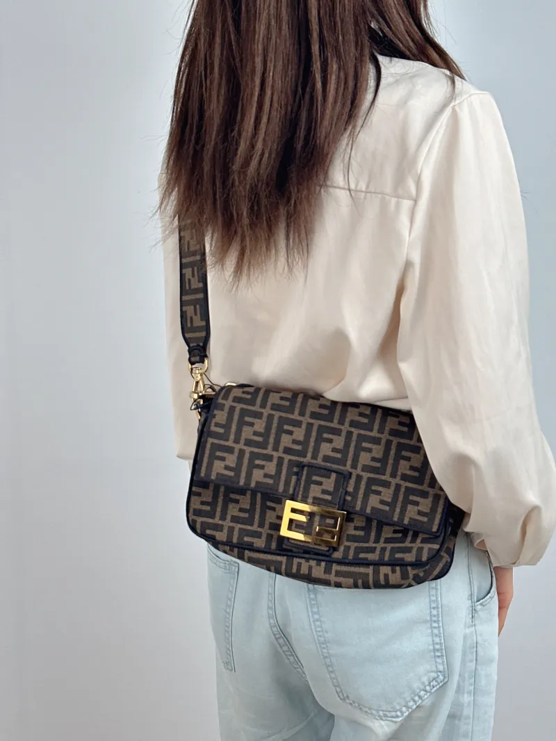 FENDI Crossbody Bag Baguette Baguette Bag Brown Canvas Medium 27 × 6 × 15 cm — on-model view 1 of 2