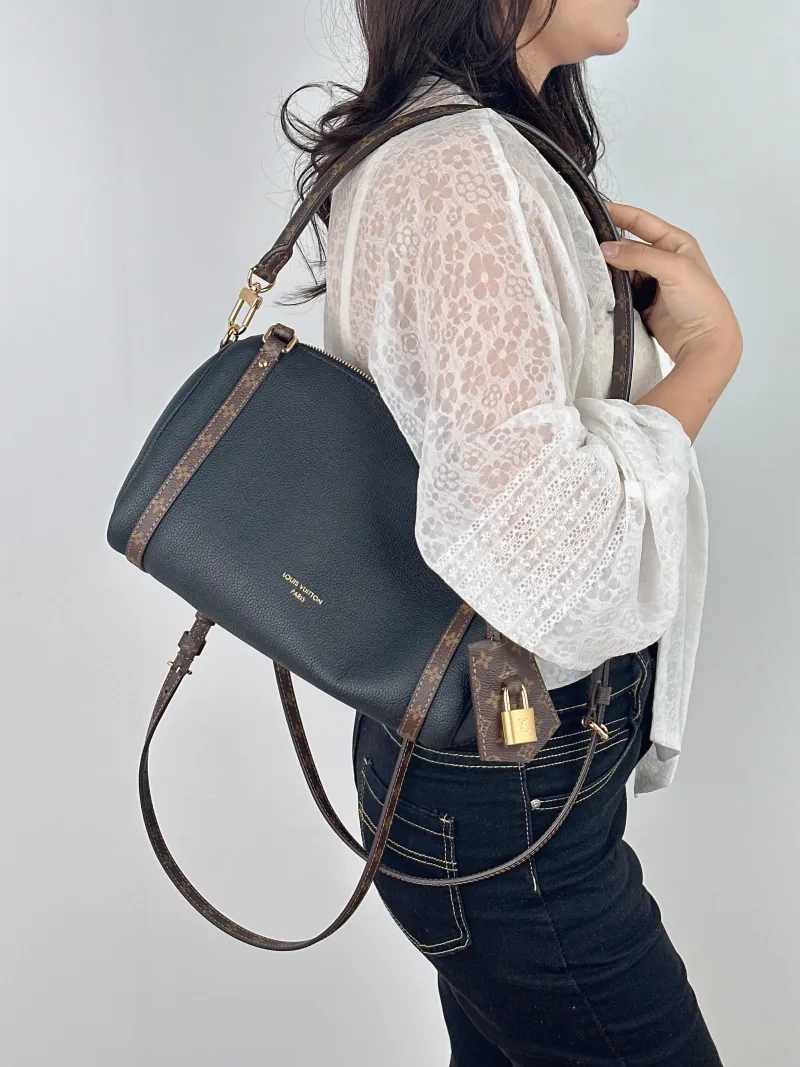 Louis Vuitton Shoulder Bag EXPRESS Shoulder Bag Black Calfskin Small 26 × 13.5 × 17 cm — on-model view 1 of 2