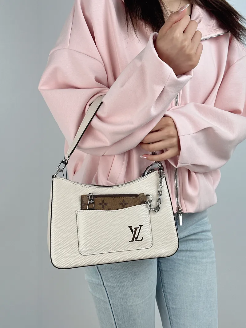 Louis Vuitton Crossbody Bag MARELLE White Epi Embossed Calfskin Small 25 × 8 × 15 cm — on-model view 1 of 2