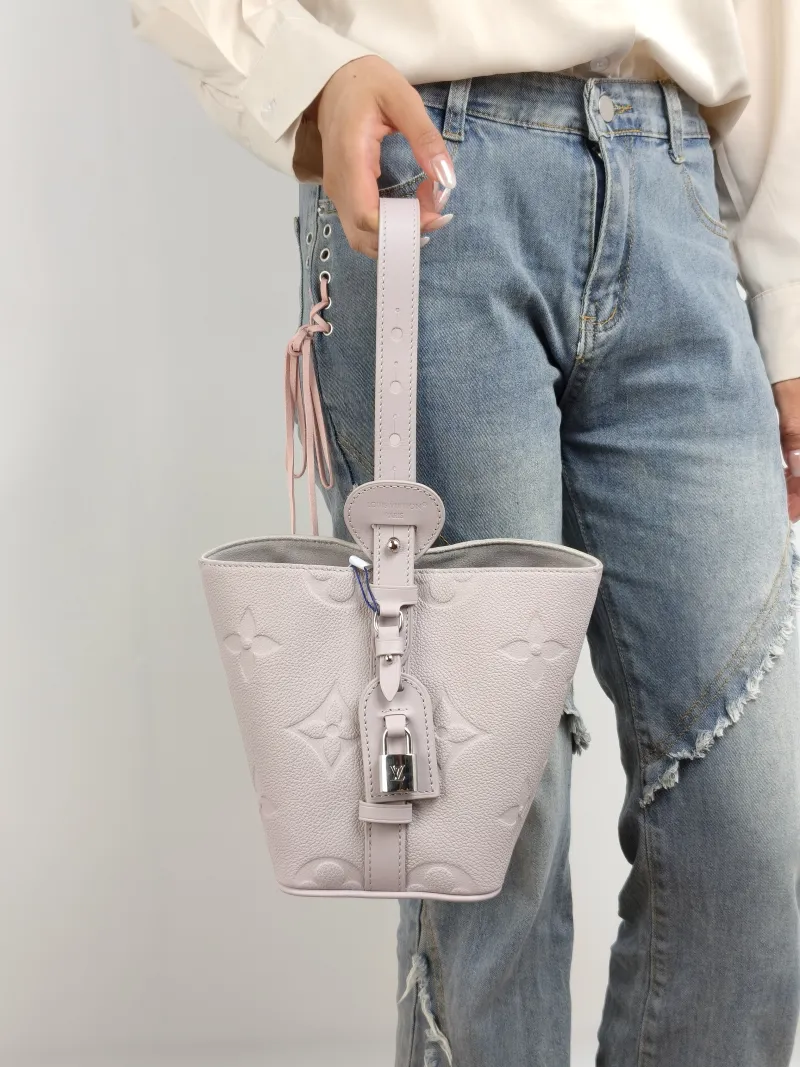 Louis Vuitton Top Handle Bag ALL IN BB Grey Calfskin BB 16 × 12 × 18 cm — on-model view 2 of 3