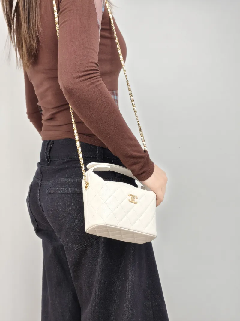 Chanel Crossbody Bag Crossbody Bag White Gold-Tone Hardware Grained Calfskin One Size 21.5 × 7.5 × 19 cm — on-model view 1 of 3