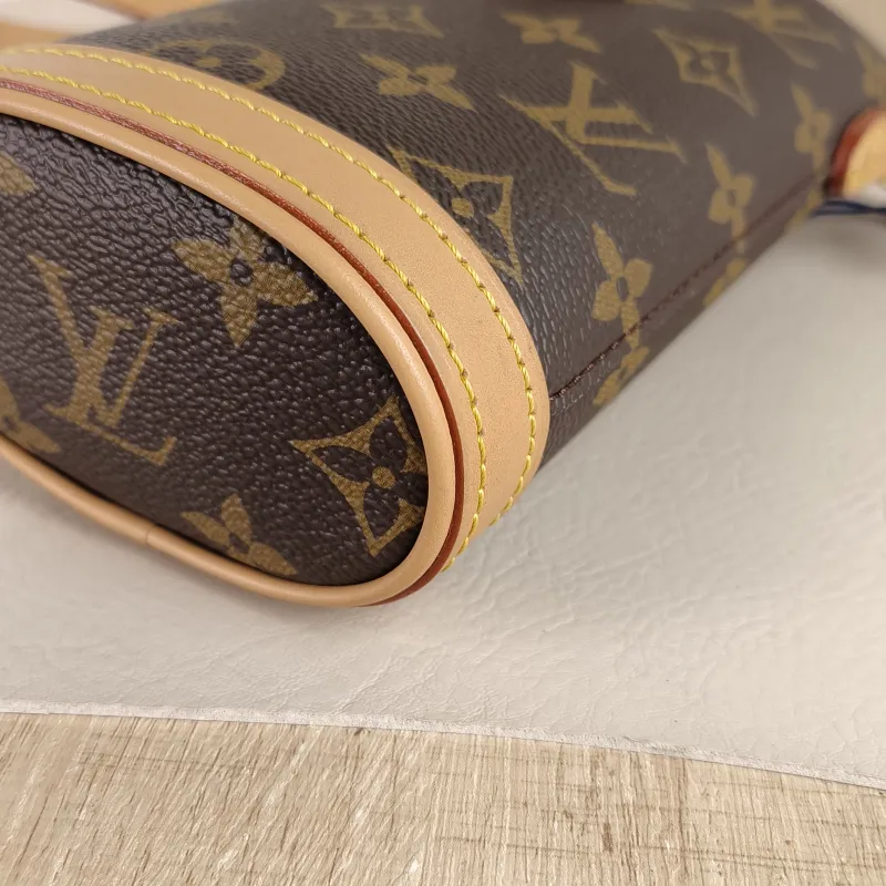 Louis Vuitton Crossbody Bag Fold Me Monogram PVC Mini 14.5 × 6.5 × 18 cm — detail view 5 of 10