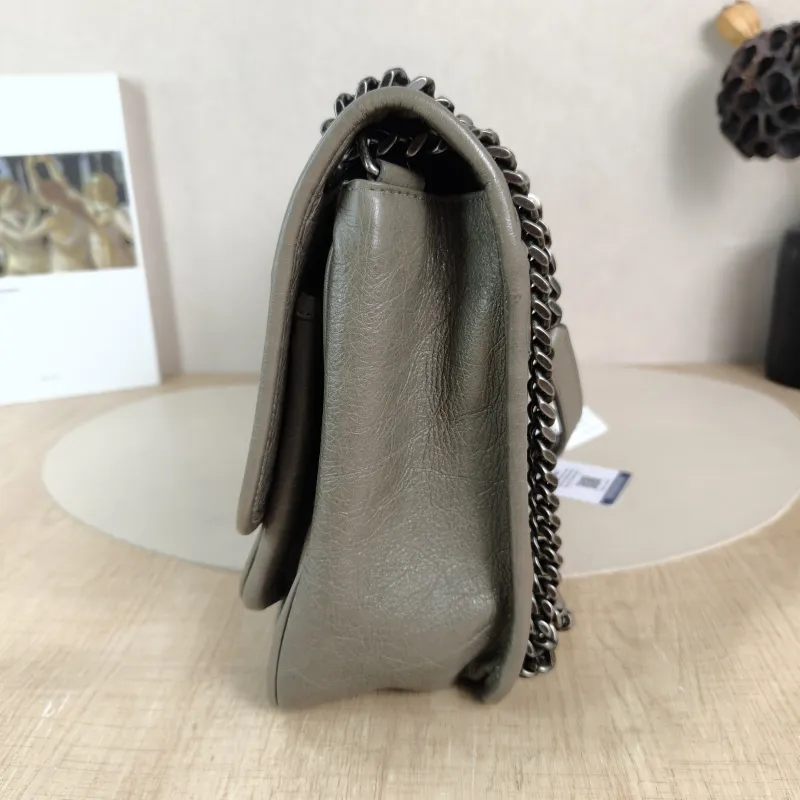 SAINT LAURENT Crossbody Bag Niki D Waxed Leather Medium 28 × 8.5 × 20 cm — detail view 10 of 12