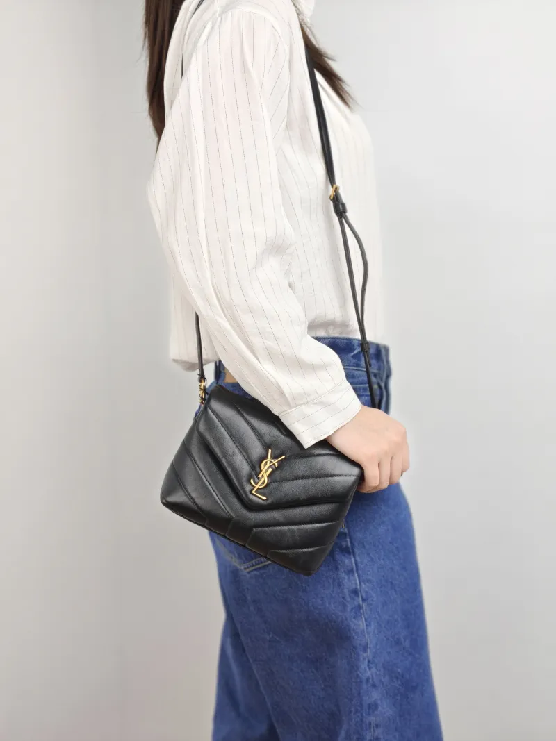 SAINT LAURENT Crossbody Bag LOULOU Black Calfskin Mini 20 × 7.5 × 14 cm — on-model view 1 of 2