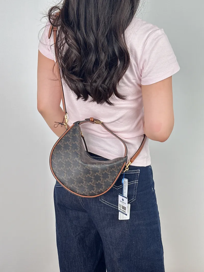 CELINE Crossbody Bag TEEN LULU hobo Monogram PVC Small 21 × 5 × 24 cm — on-model view 1 of 2