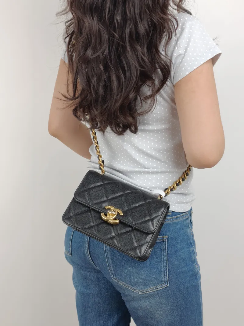 Chanel Crossbody Bag Edition Black Grained Calfskin 20 × 7 × 14.5 cm — on-model view 1 of 2