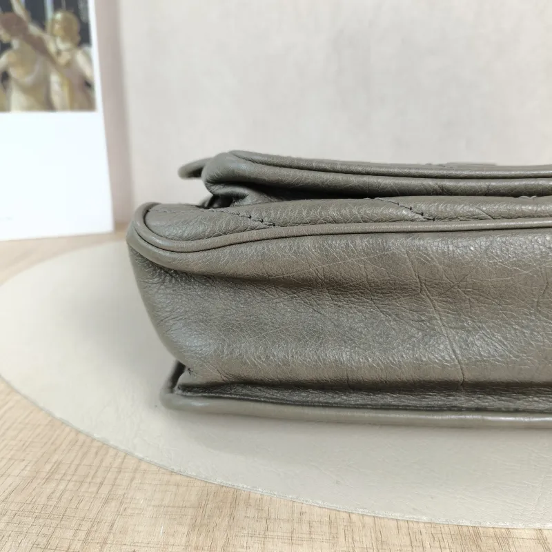 SAINT LAURENT Crossbody Bag Niki D Waxed Leather Medium 28 × 8.5 × 20 cm — detail view 2 of 12
