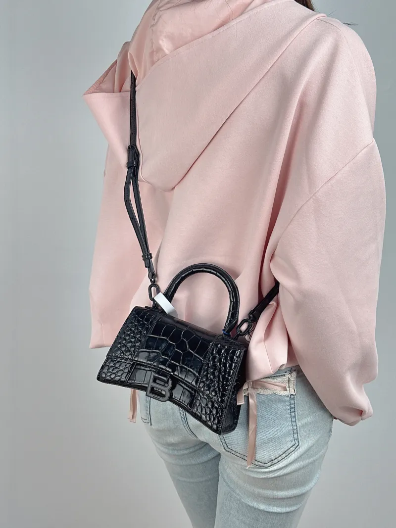 BALENCIAGA Crossbody Bag Hourglass Hourglass Bagsoblack Black Calfskin Mini 19 × 5 × 12 cm — on-model view 2 of 2