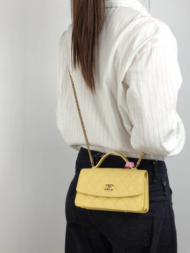 Chanel Crossbody Bag Yellow Grained Calfskin One Size 19 × 7 × 11.5 cm — on-model view 1 of 3